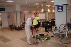 Putting the bikes back together again at Prague airport, Bob had an extra job to do