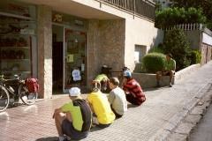 Waiting for Keith's bike to be fixed. The cycle shop owner opened up specially on a Sunday for us