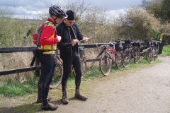 Two visitors checking out the route