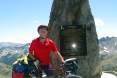 Denis at the summit cairn, la Cime de la Bonette
