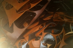 Scrap leather after the seats have been cut out