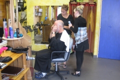 Denis has his haircut in Briançon