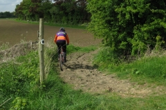 Andy crossing the old railway line near Stanford Hall
